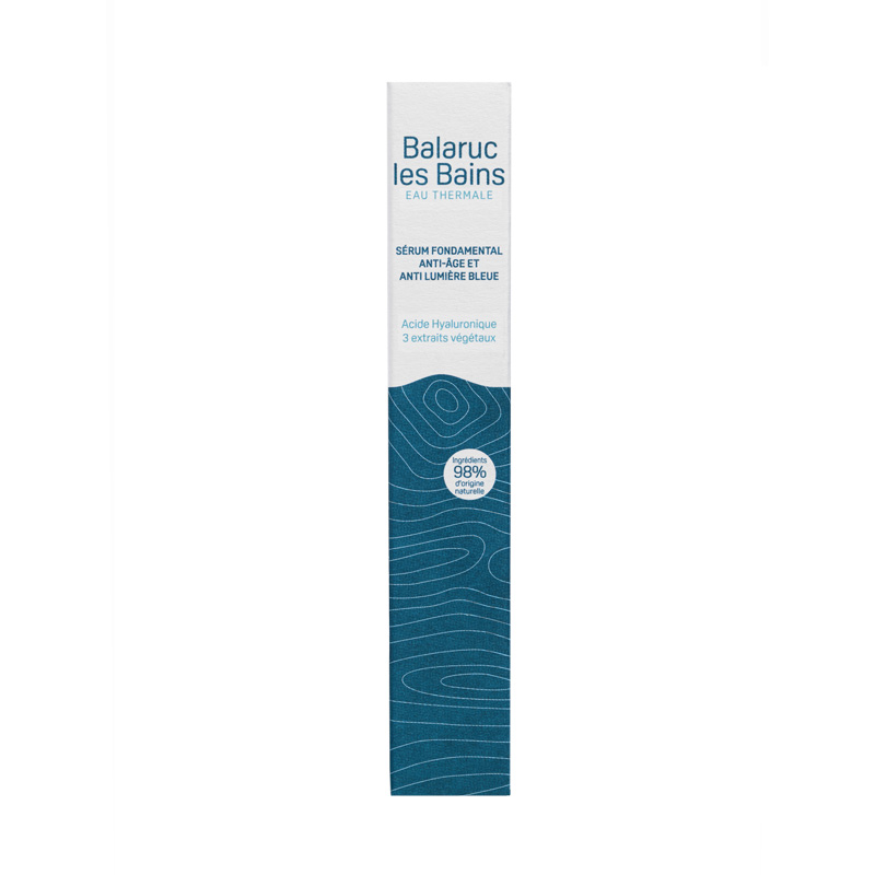 Tube de 20ml dans surpack sur fond blanc présentant le sérum fondamental anti âge anti lumière bleue à l'acide