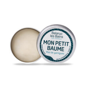 Mon Petit Baume multi-usages hydratant et apaisant en petit pot métallique vintage ouvert montrant la texture riche et onctueuse du baume au miel